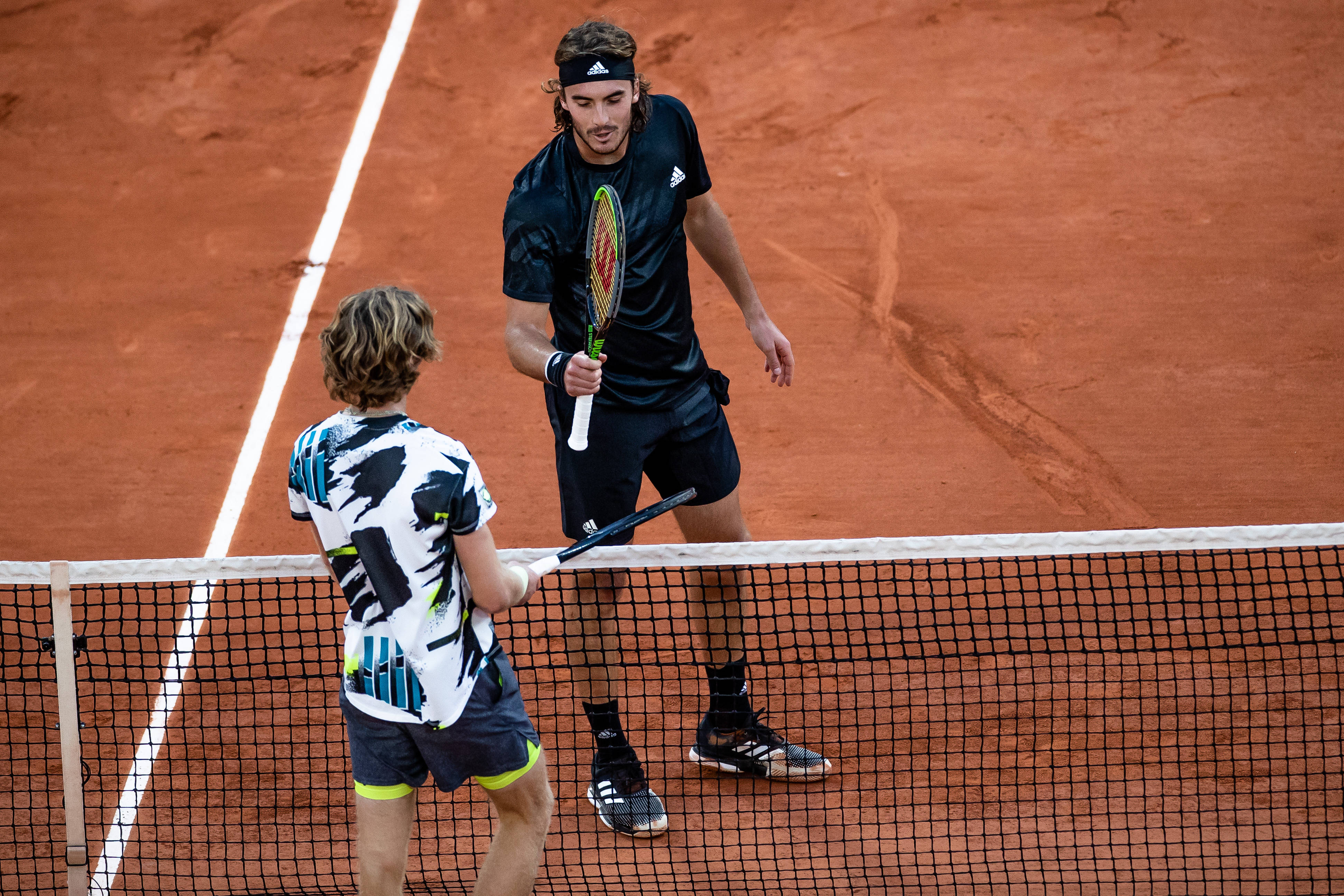 世界网球队轻取日本网球队，西西帕斯制霸全场的简单介绍